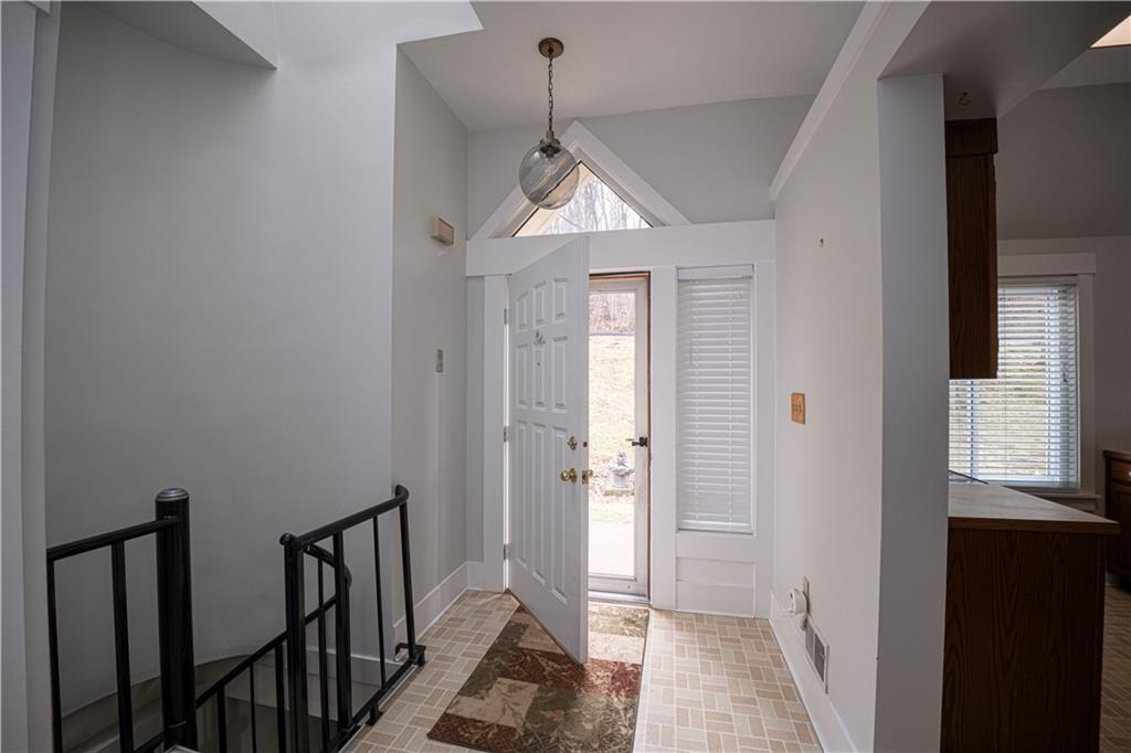 15 Ridgemead Fields Drive Plum, PA 15147 - Photo 3 of 32 a view of a hallway view with wooden floor and staircase
