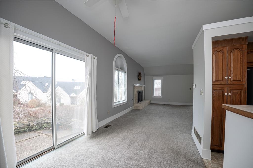 15 Ridgemead Fields Drive Plum, PA 15147 - Photo 8 of 32 a view of a big room with wooden floor and windows