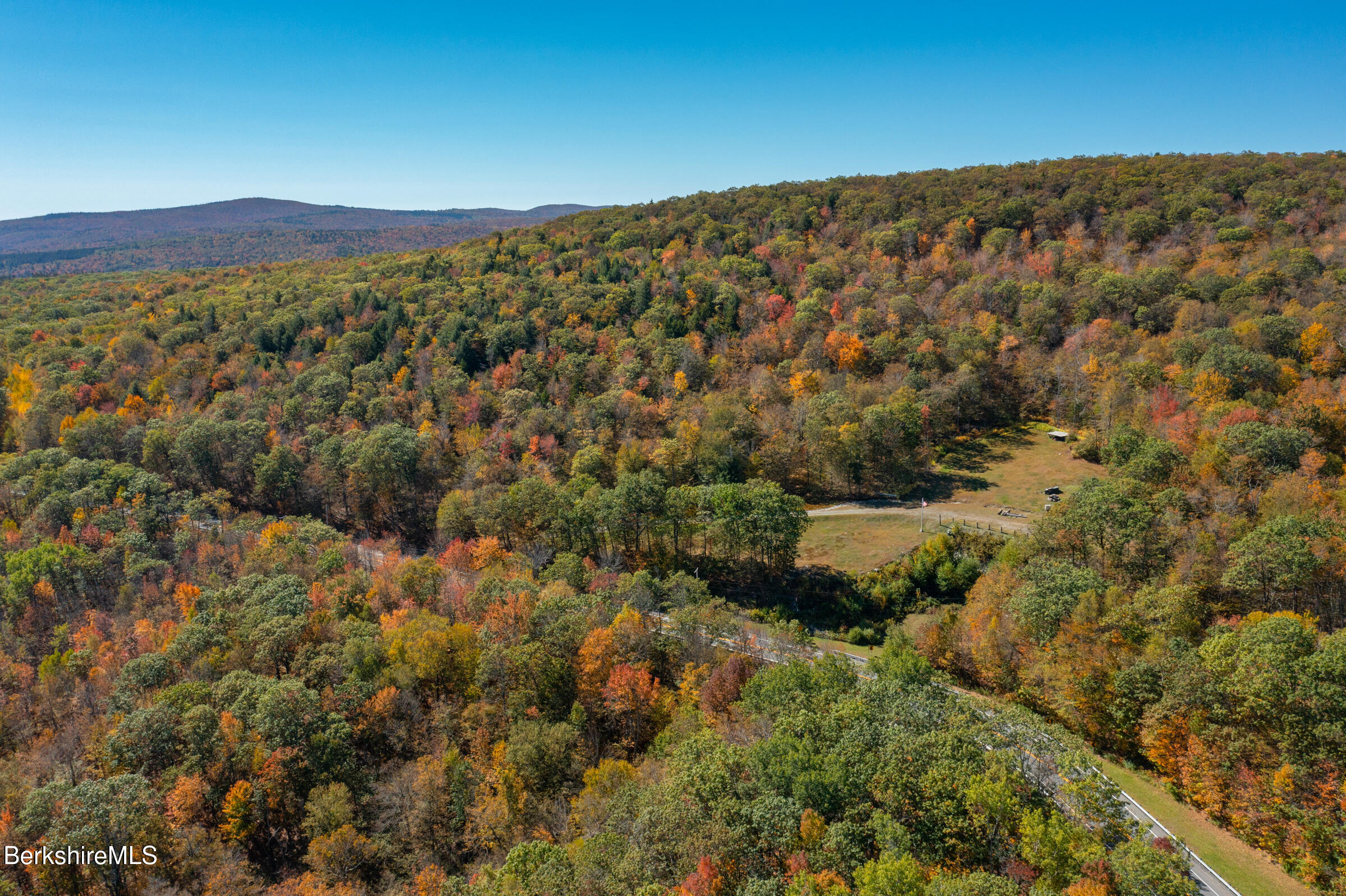 360 Mohawk Trail Florida, MA 01247 - Photo 6 of 12 a view of a large building with mountains in the background