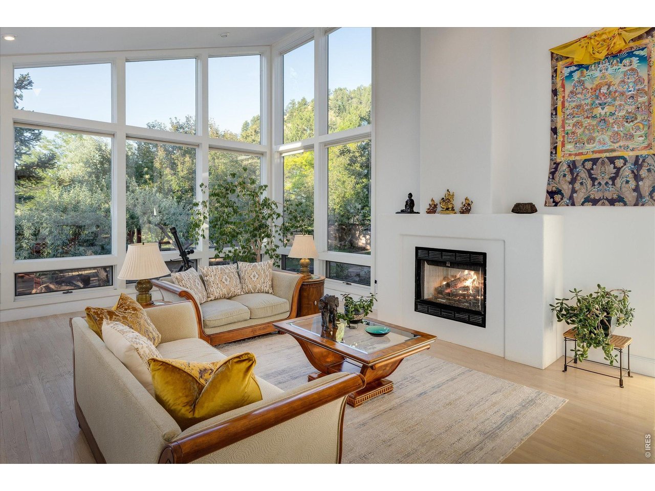 495 South Cedar Brook Road Boulder, CO 80304 - Photo 15 of 40 Gas fireplace and vaulted ceilings highlight living space