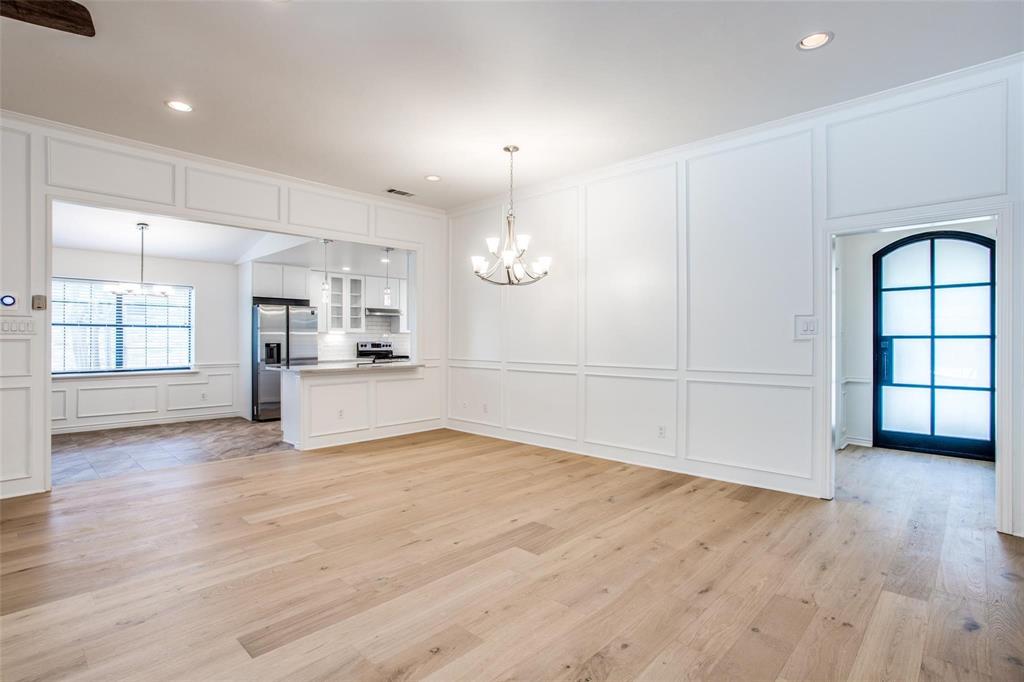 6926 Northwood Road Dallas, TX 75225 - Photo 5 of 29 a view of a kitchen with wooden floor and a kitchen