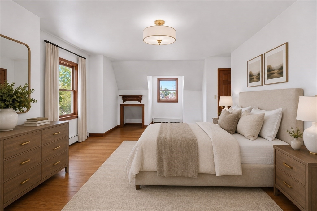 67 Wituwamat Road Weymouth, MA 02191 - Photo 28 of 42 a spacious bedroom with a bed and a dresser