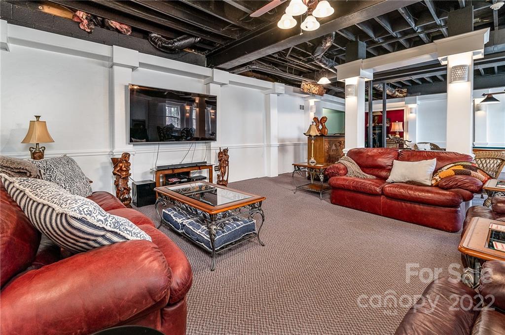 3802 Gordon Street Terrell, NC 28682 - Photo 41 of 48 a living room with furniture and a flat screen tv