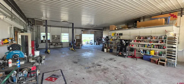 a view of a room with storage and racks