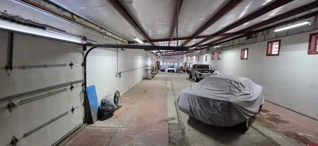 a backyard of a house with seating space