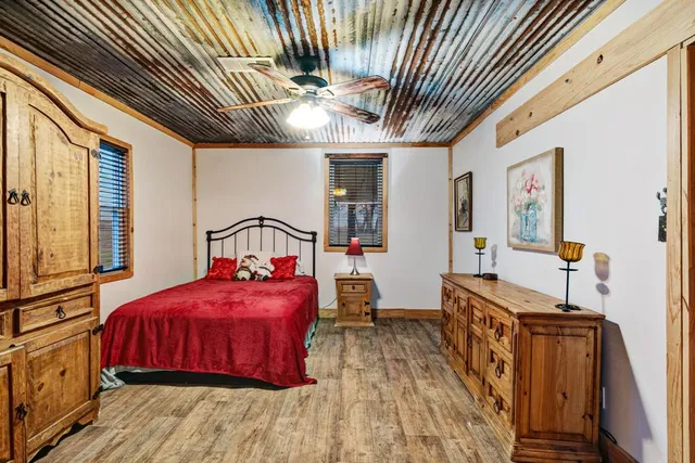 a bathroom with a toilet a sink and a mirror