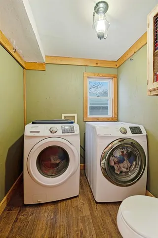 a view of room with furniture and window