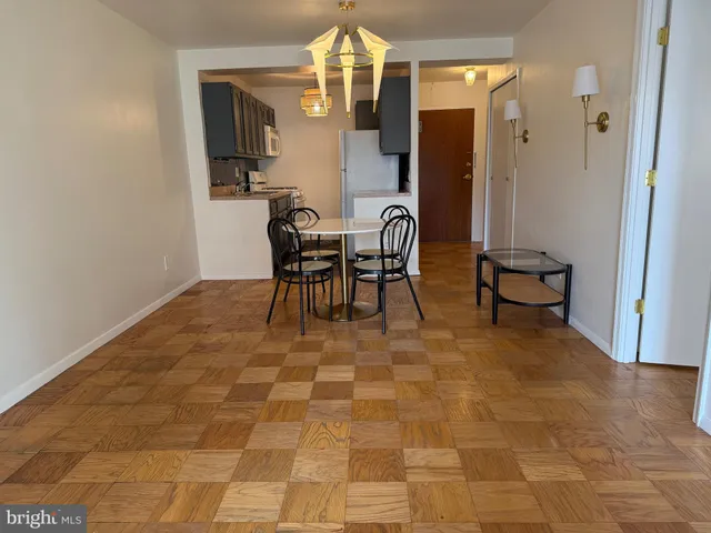 a view of a dining room with furniture