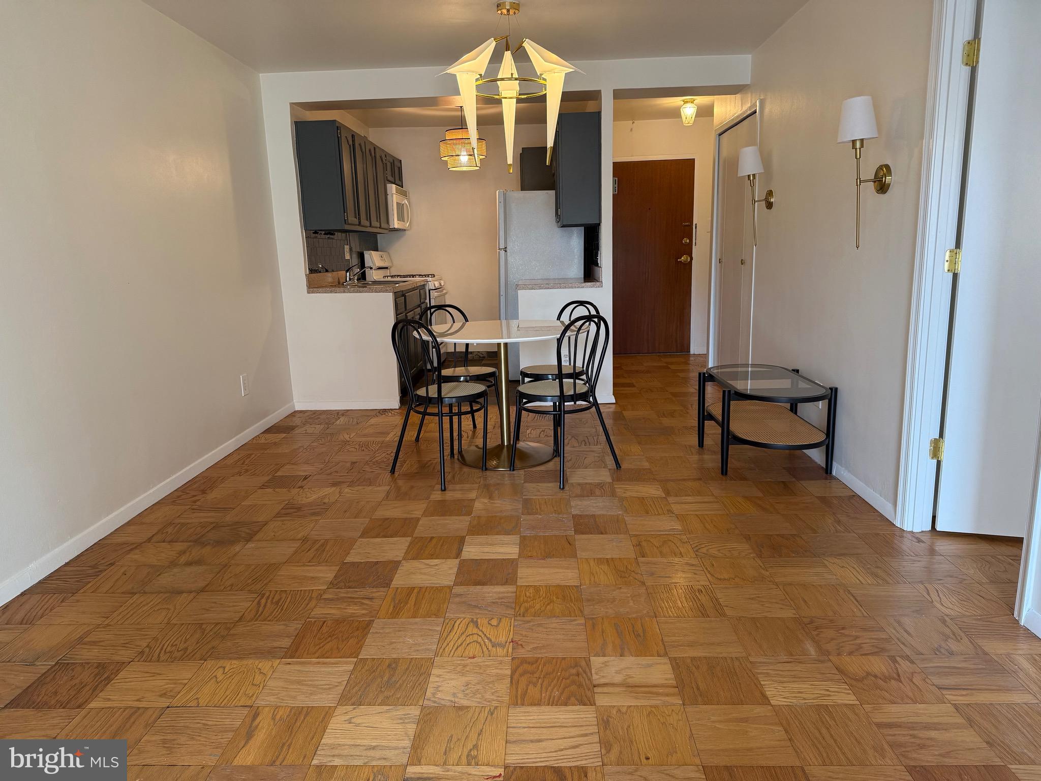 730 24th Street Northwest Washington, DC 20037 - Photo 1 of 6 a view of a dining room with furniture