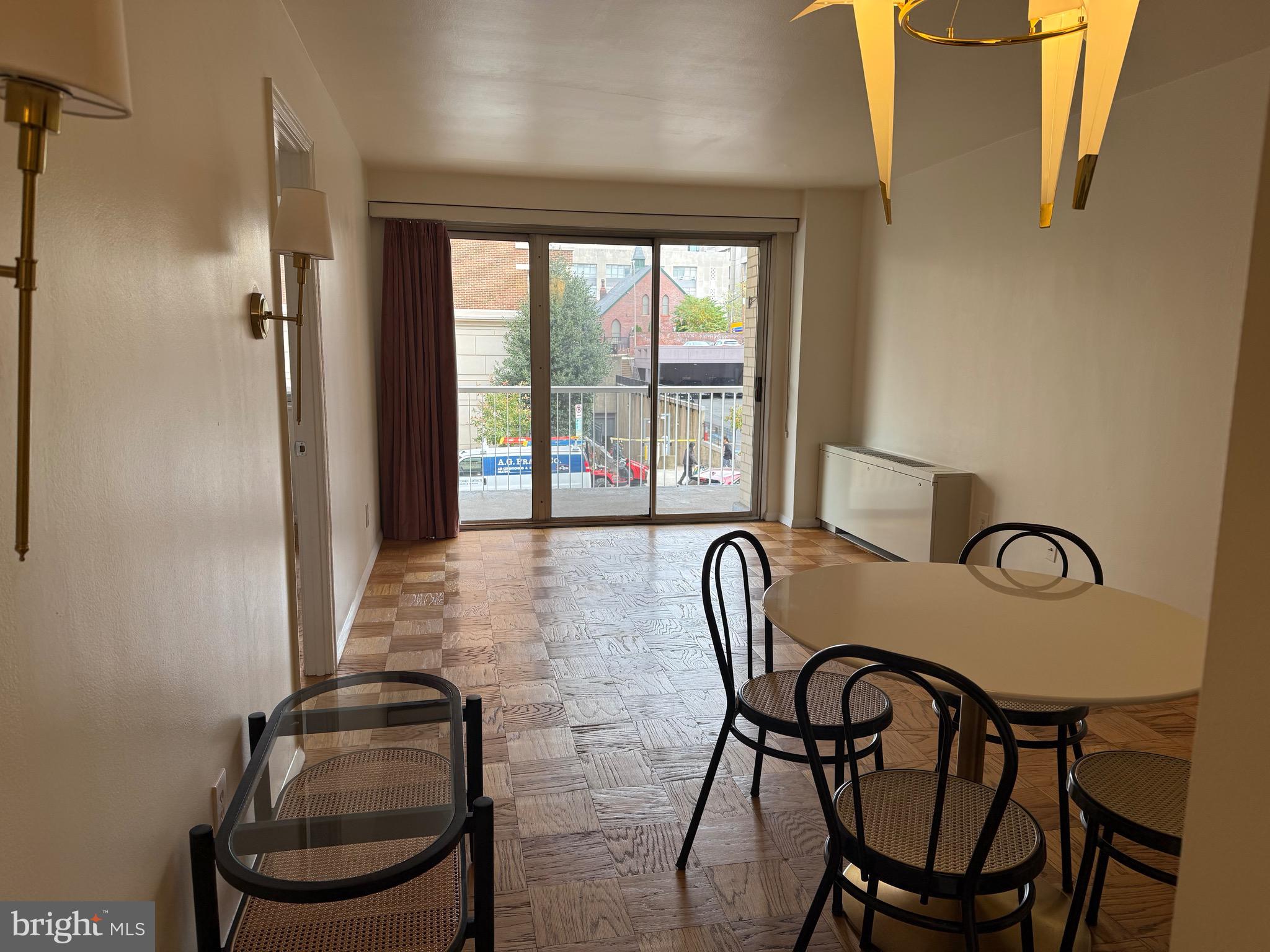 730 24th Street Northwest Washington, DC 20037 - Photo 6 of 6 a view of a dining room with furniture window and outside view