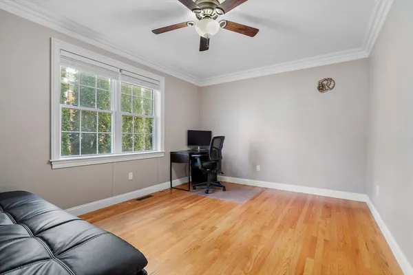 a bedroom with a workspace