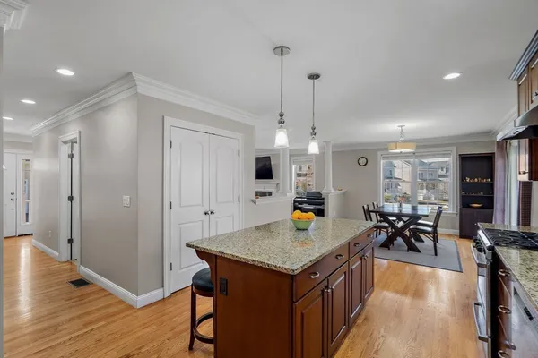 a view of a kitchen and dining room