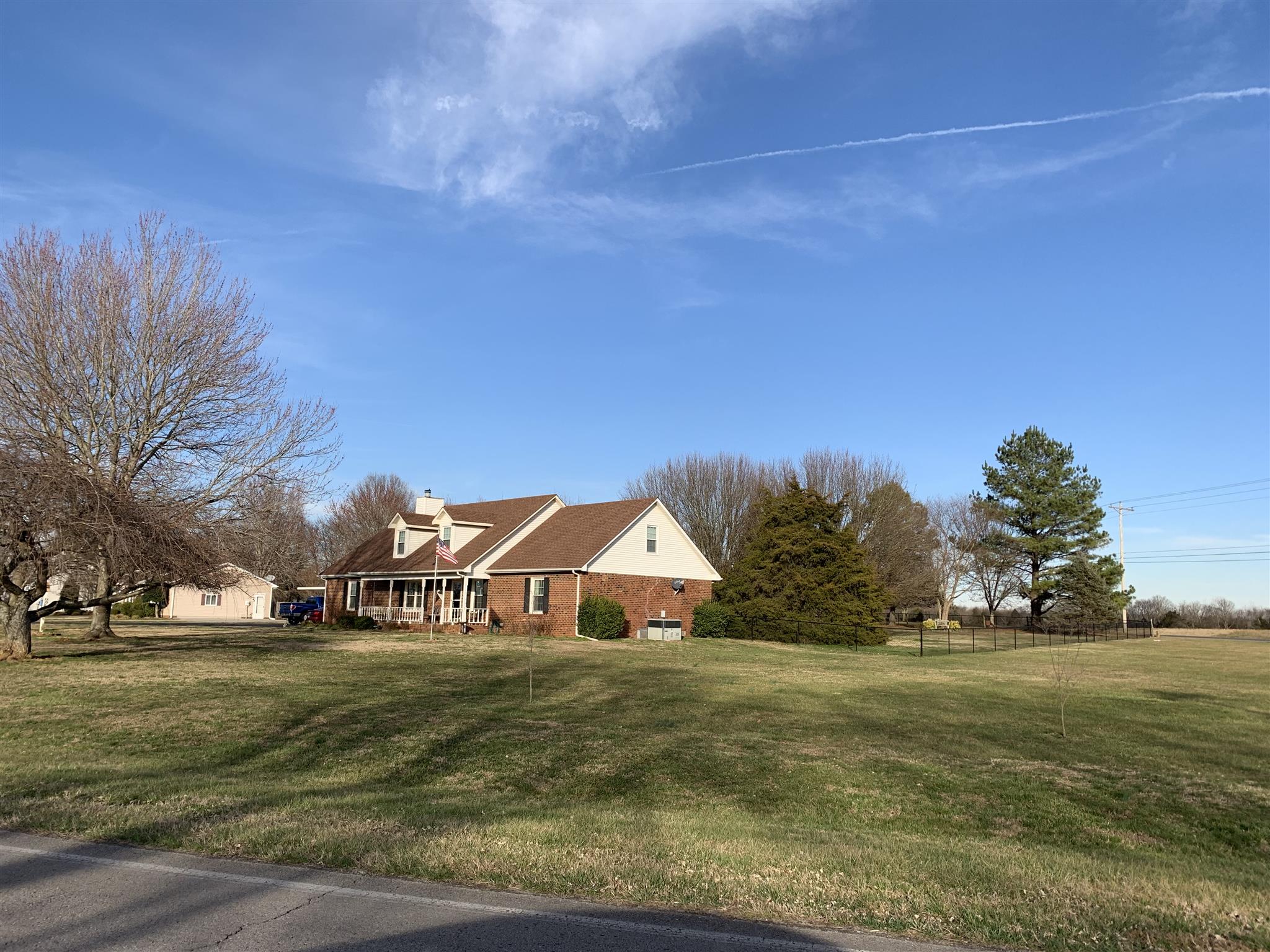 a view of big house with outdoor space