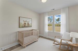 2760 River Meadow Spring Hope, NC 27882 - Photo 6 of 42 a bedroom with a bed and a window
