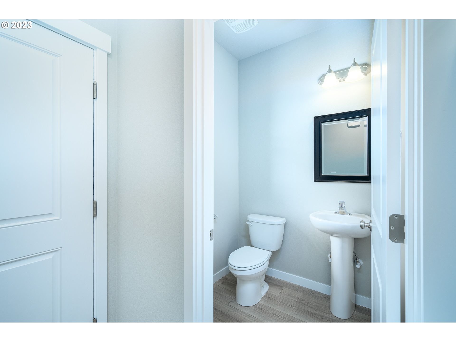 3162 South Magnolia Street, Unit LT754 Cornelius, OR 97113 - Photo 7 of 40 a bathroom with a toilet sink and mirror