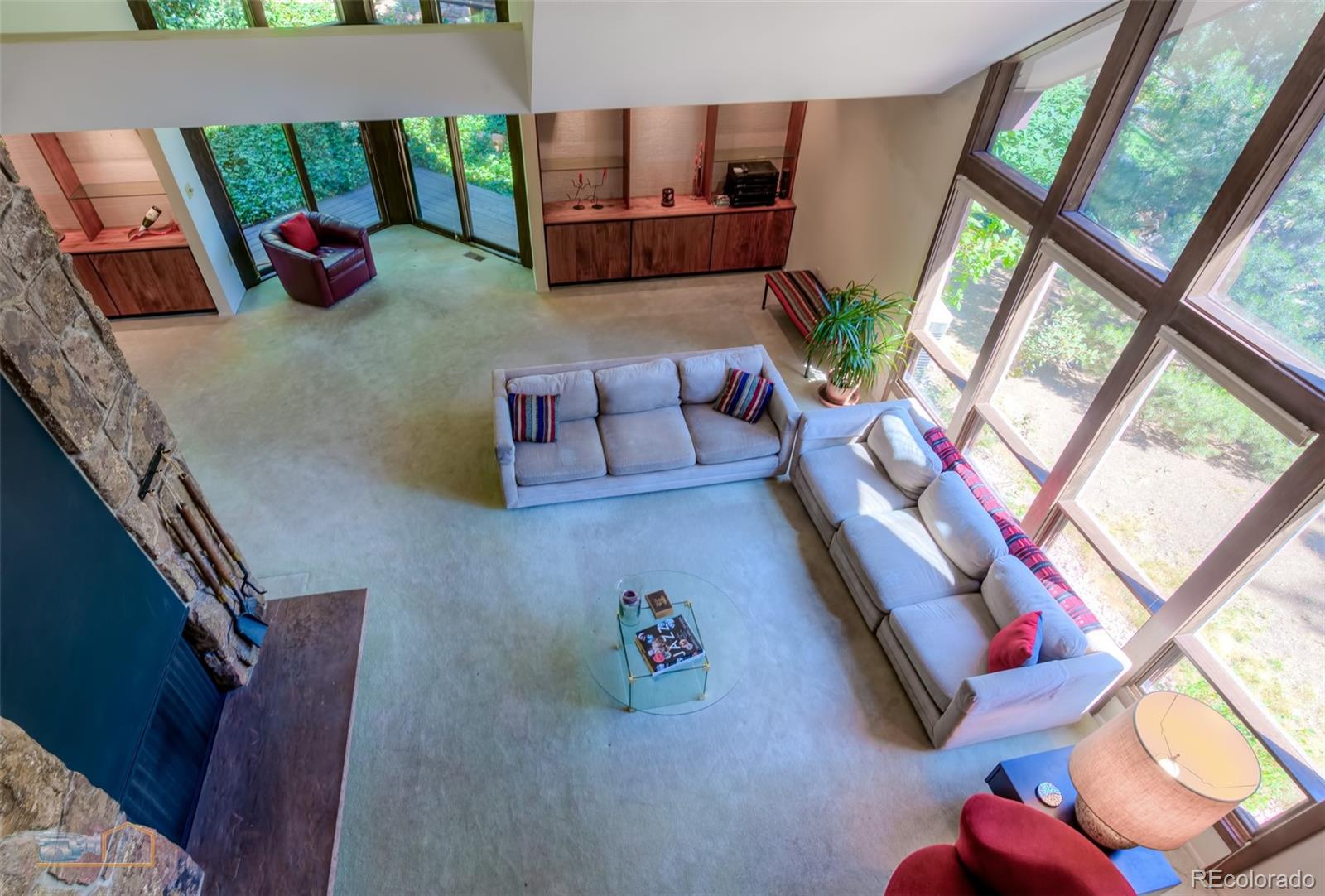 1425 Bellevue Drive Boulder, CO 80302 - Photo 12 of 40 a living room with furniture and a floor to ceiling window