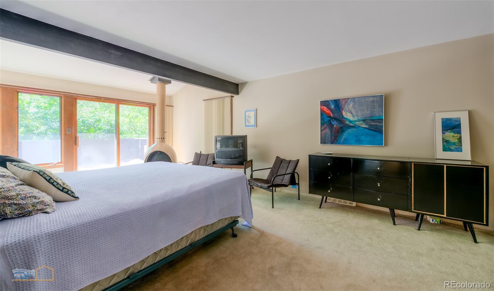 1425 Bellevue Drive Boulder, CO 80302 - Photo 14 of 40 a bedroom with a bed and a window