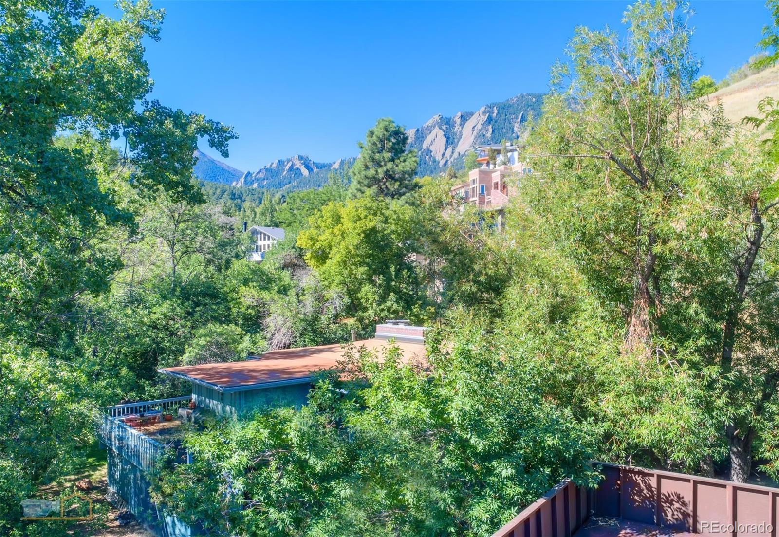 1425 Bellevue Drive Boulder, CO 80302 - Photo 19 of 40 a backyard of a house with outdoor seating and green space