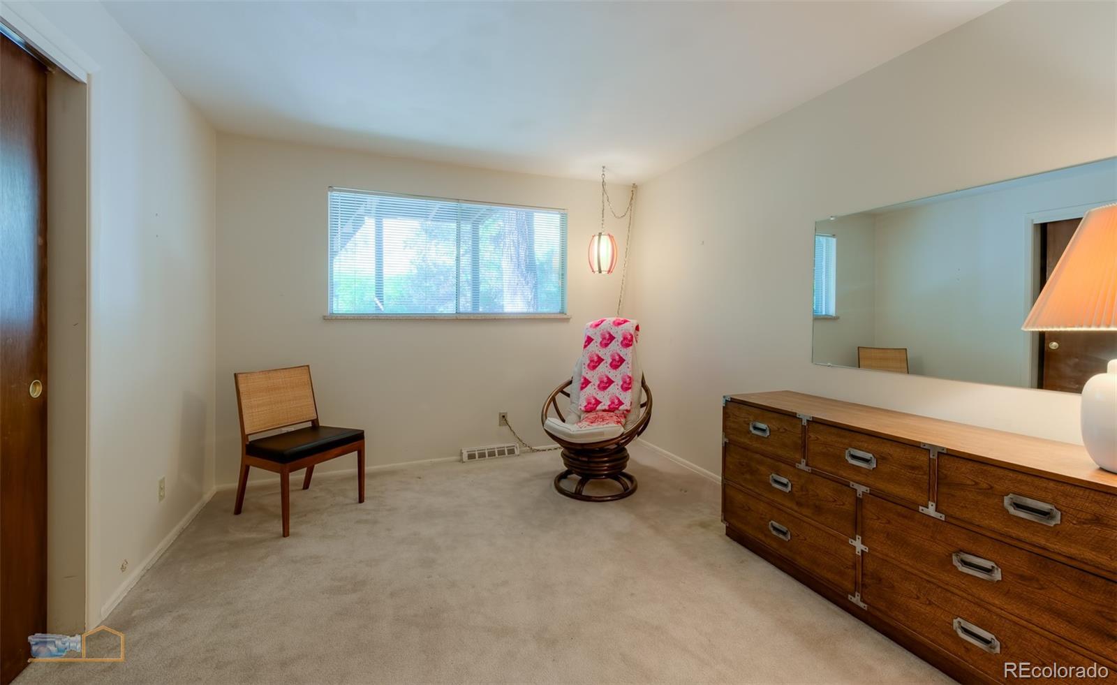 1425 Bellevue Drive Boulder, CO 80302 - Photo 21 of 40 a room with a dresser and a window