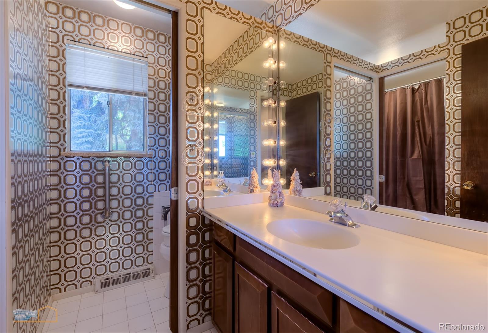 1425 Bellevue Drive Boulder, CO 80302 - Photo 24 of 40 a bathroom with a sink and a mirror