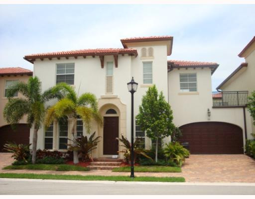 99 Via Poinciana Street, Unit 99 Boca Raton, FL 33487 - Photo 1 of 16 Exterior Front