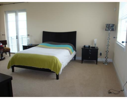 99 Via Poinciana Street, Unit 99 Boca Raton, FL 33487 - Photo 7 of 16 Master Bedroom