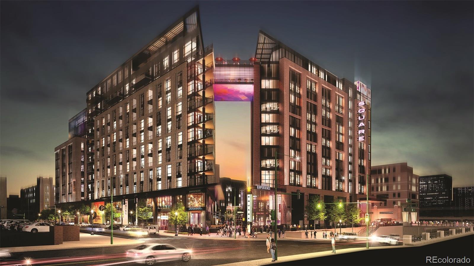 1901 Wazee Street, Unit 311 Denver, CO 80202 - Photo 12 of 17 a city street lined with tall buildings and street