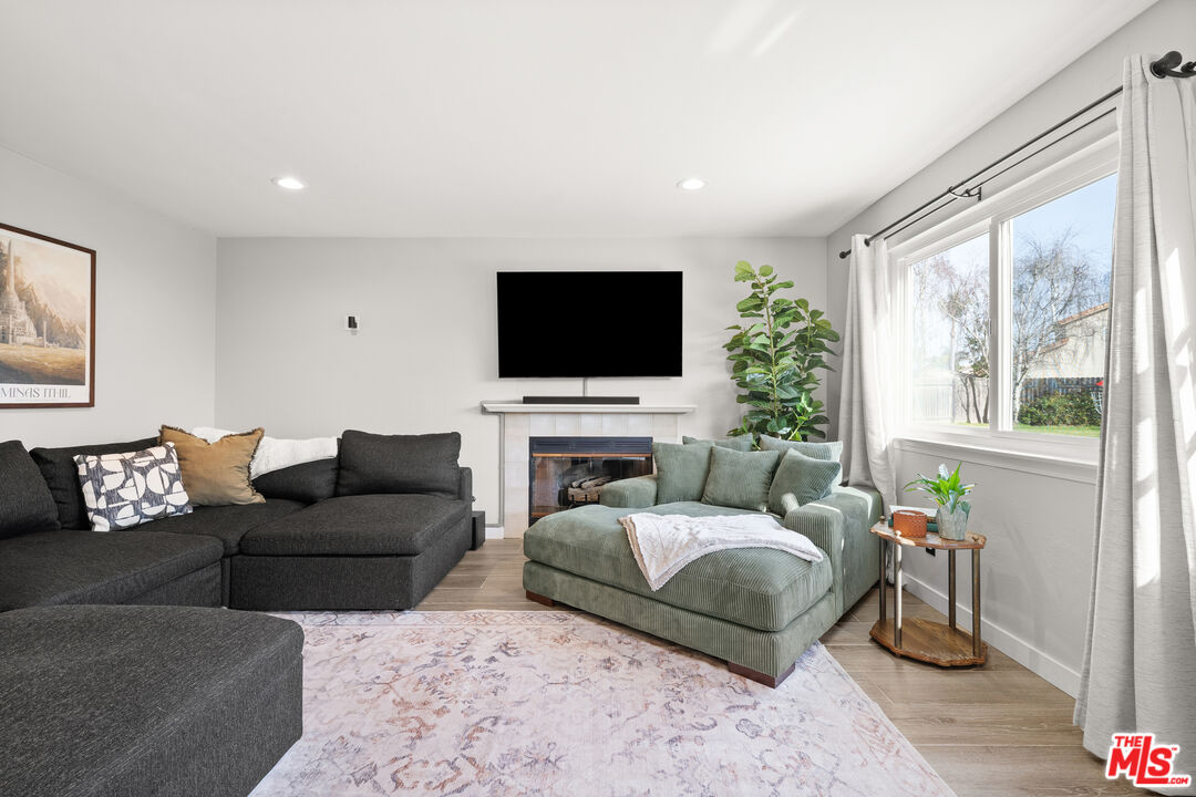824 Cooper Drive Lompoc, CA 93436 - Photo 12 of 24 a living room with furniture and a flat screen tv
