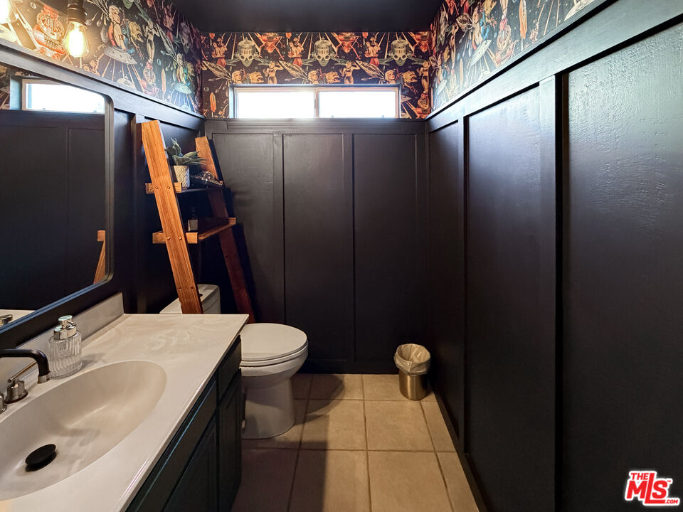 824 Cooper Drive Lompoc, CA 93436 - Photo 13 of 24 a bathroom with a sink and a mirror