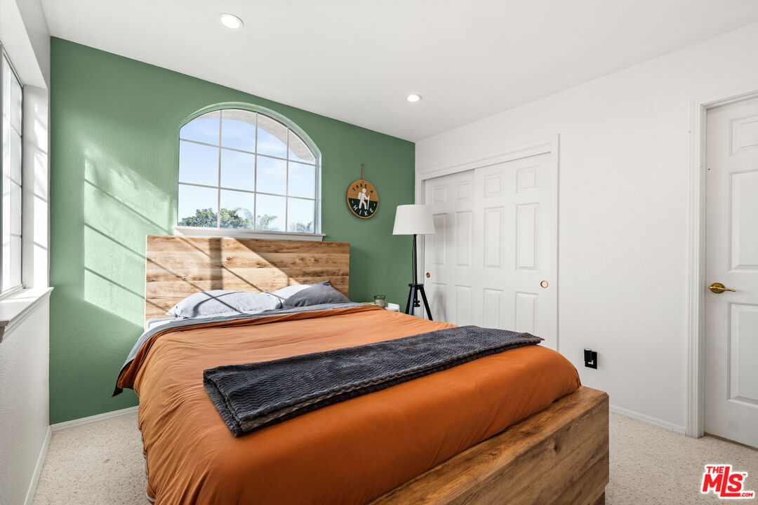 824 Cooper Drive Lompoc, CA 93436 - Photo 16 of 24 a bedroom with a bed and a window