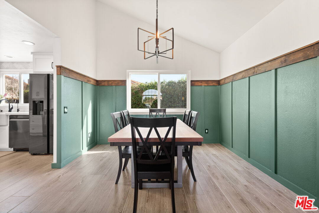 824 Cooper Drive Lompoc, CA 93436 - Photo 7 of 24 a view of a dining room with furniture window and wooden floor