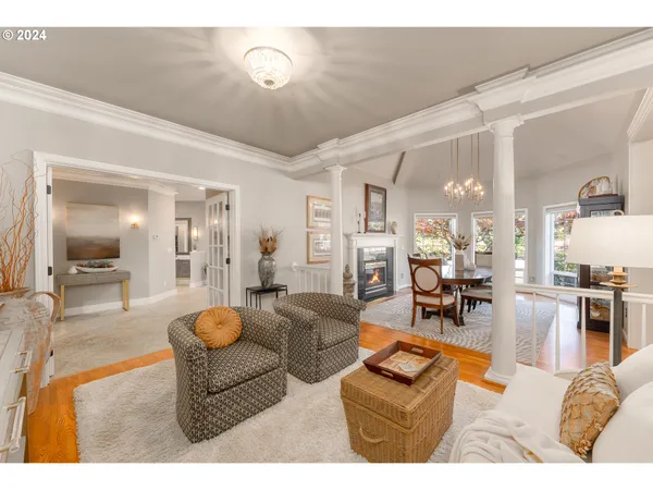 a living room with furniture and a table