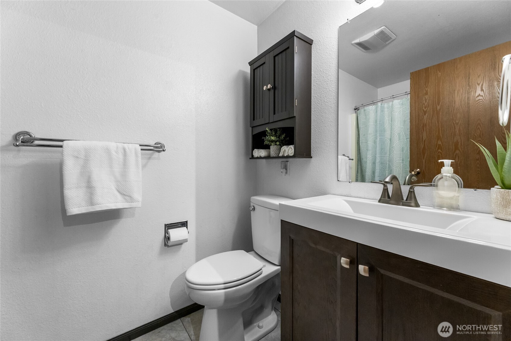 25847 185th Place Southeast Covington, WA 98042 - Photo 11 of 17 a bathroom with a sink a toilet and mirror