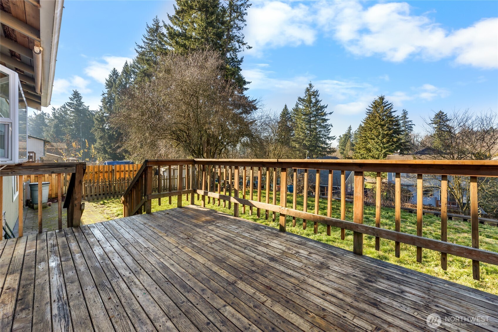 25847 185th Place Southeast Covington, WA 98042 - Photo 16 of 17 a balcony with wooden floor and city view