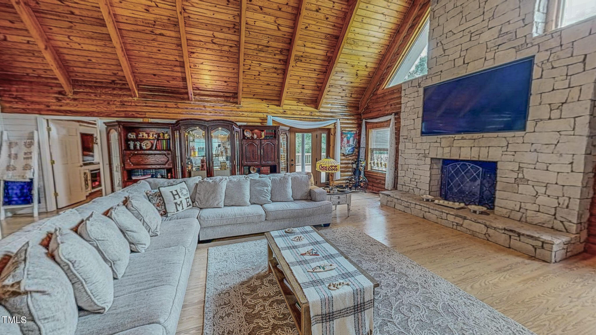 9529 Hester Road Hurdle Mills, NC 27541 - Photo 14 of 85 a living room with furniture and a fireplace