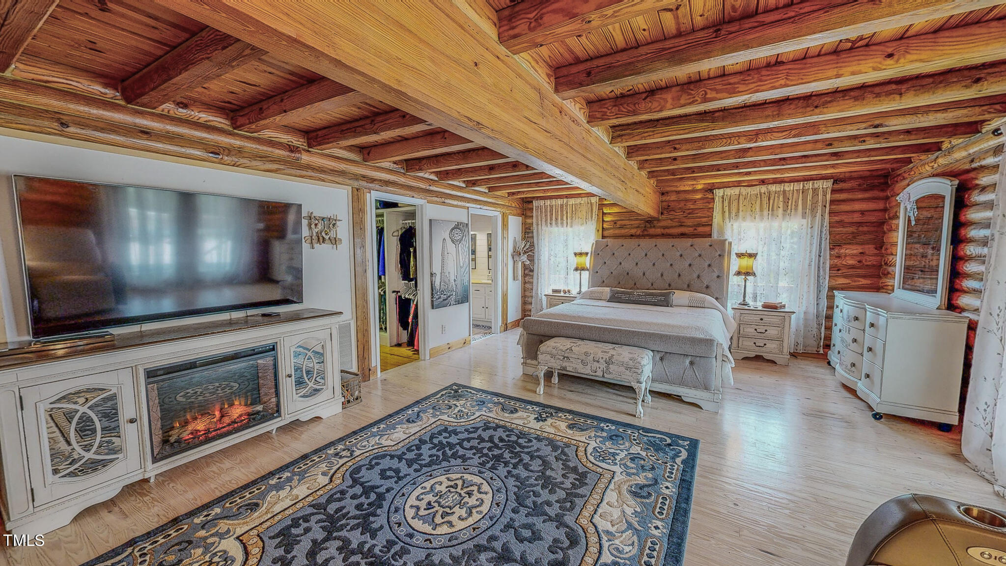 9529 Hester Road Hurdle Mills, NC 27541 - Photo 17 of 85 a living room with furniture and a flat screen tv