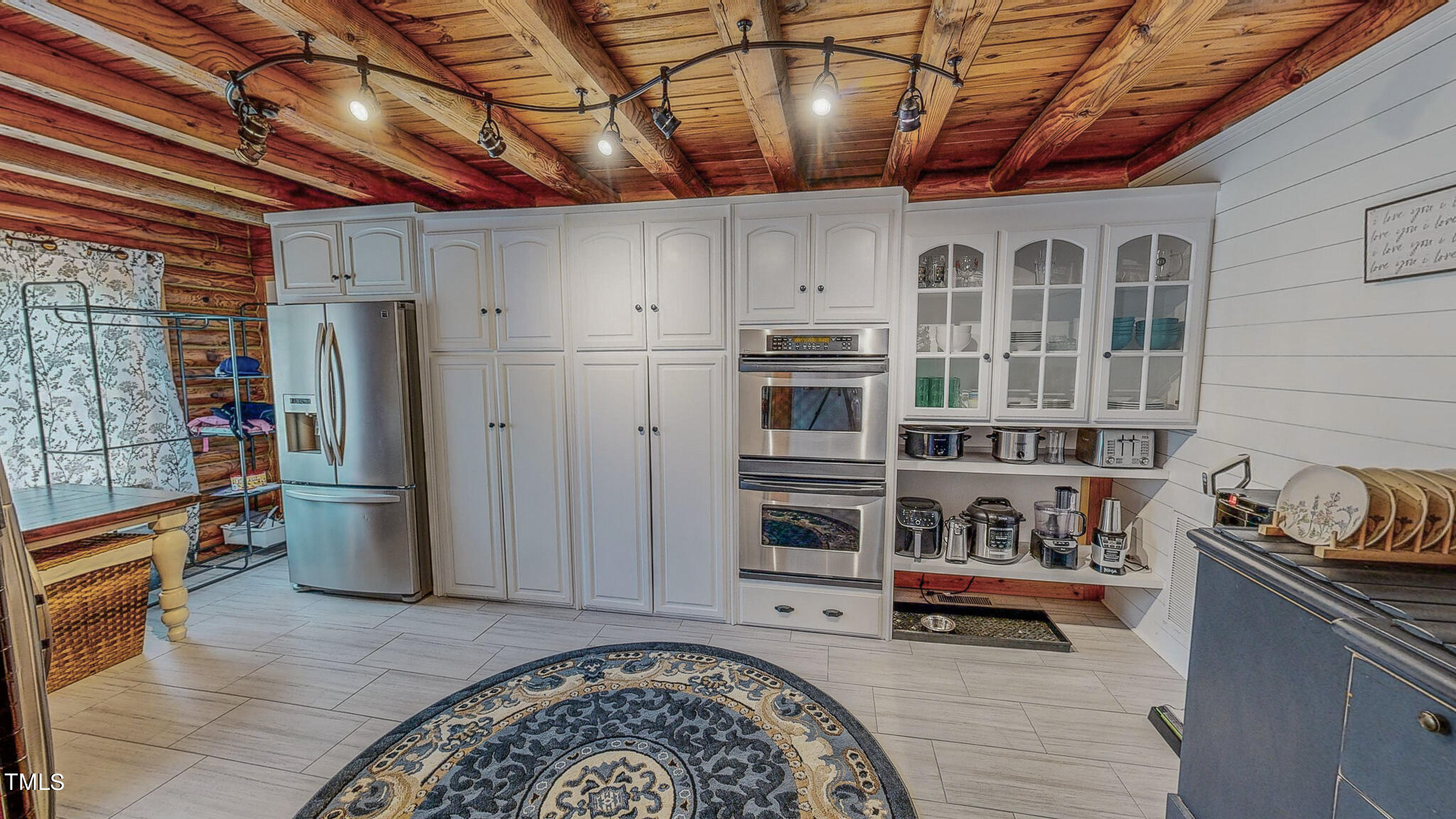 9529 Hester Road Hurdle Mills, NC 27541 - Photo 22 of 85 a kitchen with stainless steel appliances granite countertop a refrigerator and a stove