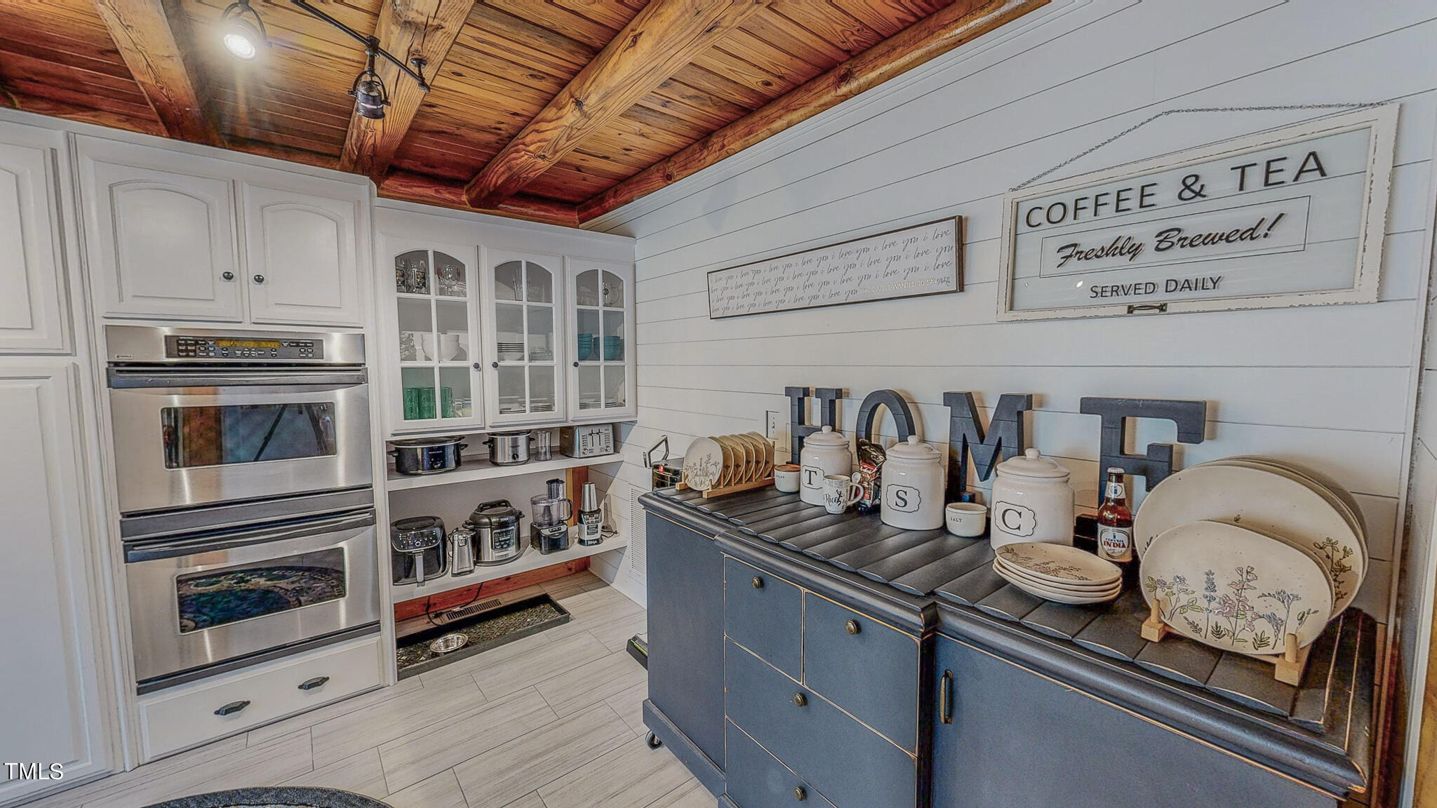 9529 Hester Road Hurdle Mills, NC 27541 - Photo 23 of 85 a kitchen with stainless steel appliances granite countertop a stove and cabinets