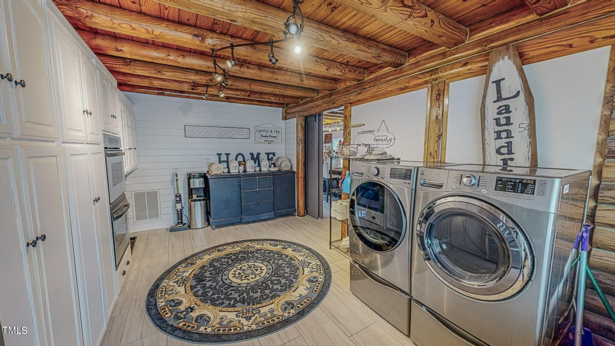 9529 Hester Road Hurdle Mills, NC 27541 - Photo 25 of 85 a view of a storage & utility room with washer and dryer