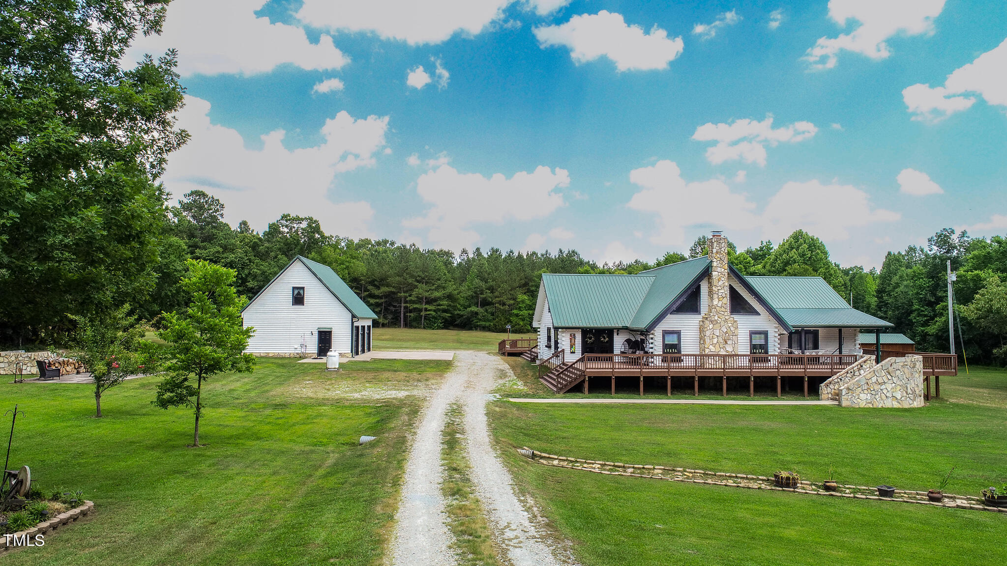 9529 Hester Road Hurdle Mills, NC 27541 - Photo 26 of 85 a view of house with garden