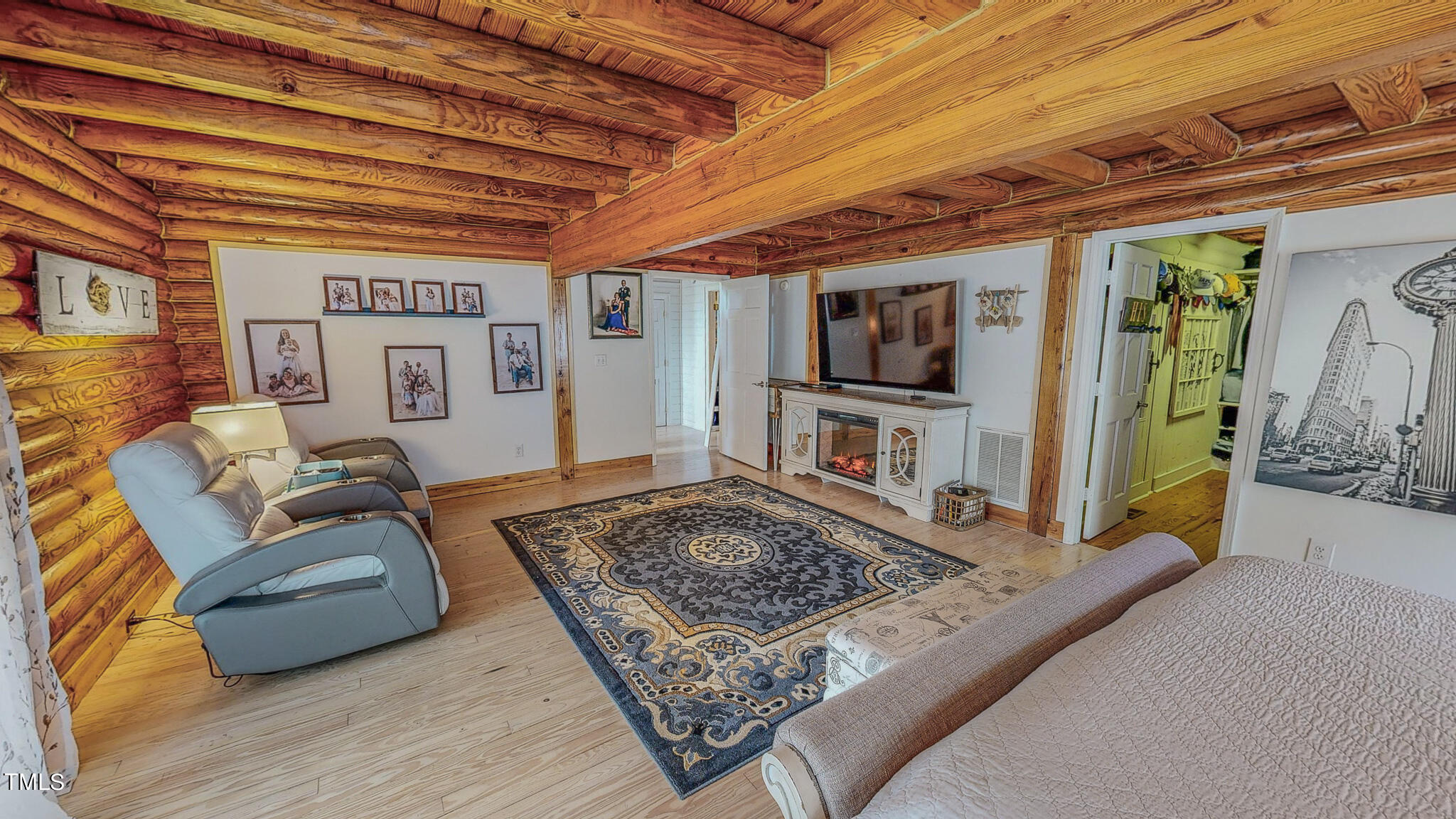 9529 Hester Road Hurdle Mills, NC 27541 - Photo 29 of 85 a living room with furniture and a flat screen tv