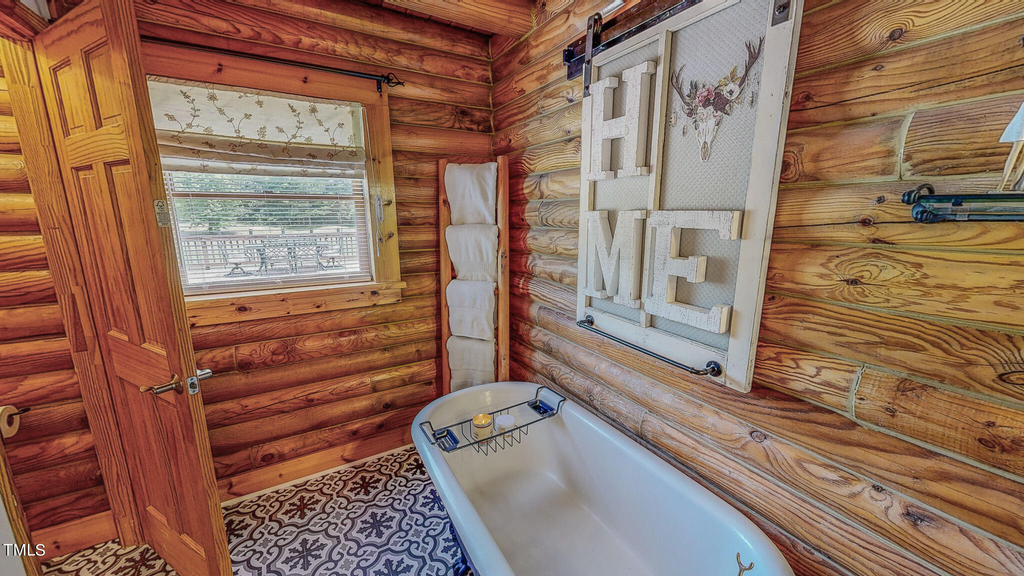 9529 Hester Road Hurdle Mills, NC 27541 - Photo 33 of 85 a view of the door of the house