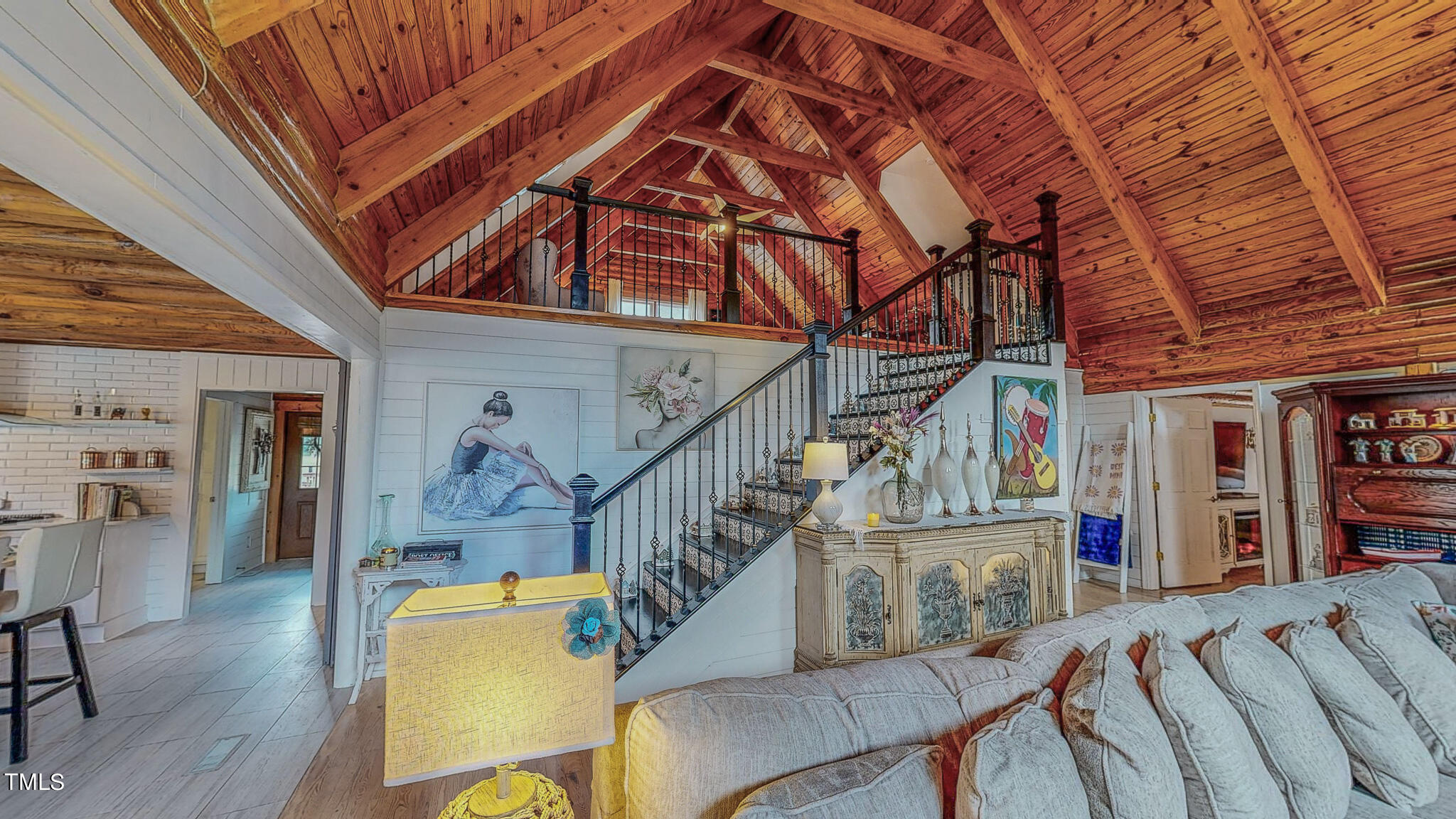 9529 Hester Road Hurdle Mills, NC 27541 - Photo 36 of 85 a view of entryway dining room and hall with wooden floor