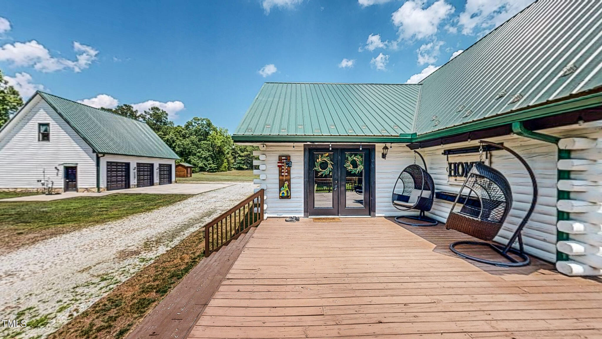9529 Hester Road Hurdle Mills, NC 27541 - Photo 40 of 85 a view of a house with backyard and sitting area