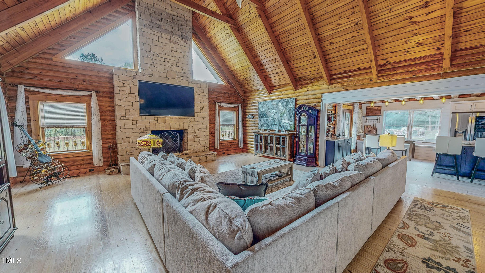 9529 Hester Road Hurdle Mills, NC 27541 - Photo 4 of 85 a living room with furniture and a fireplace