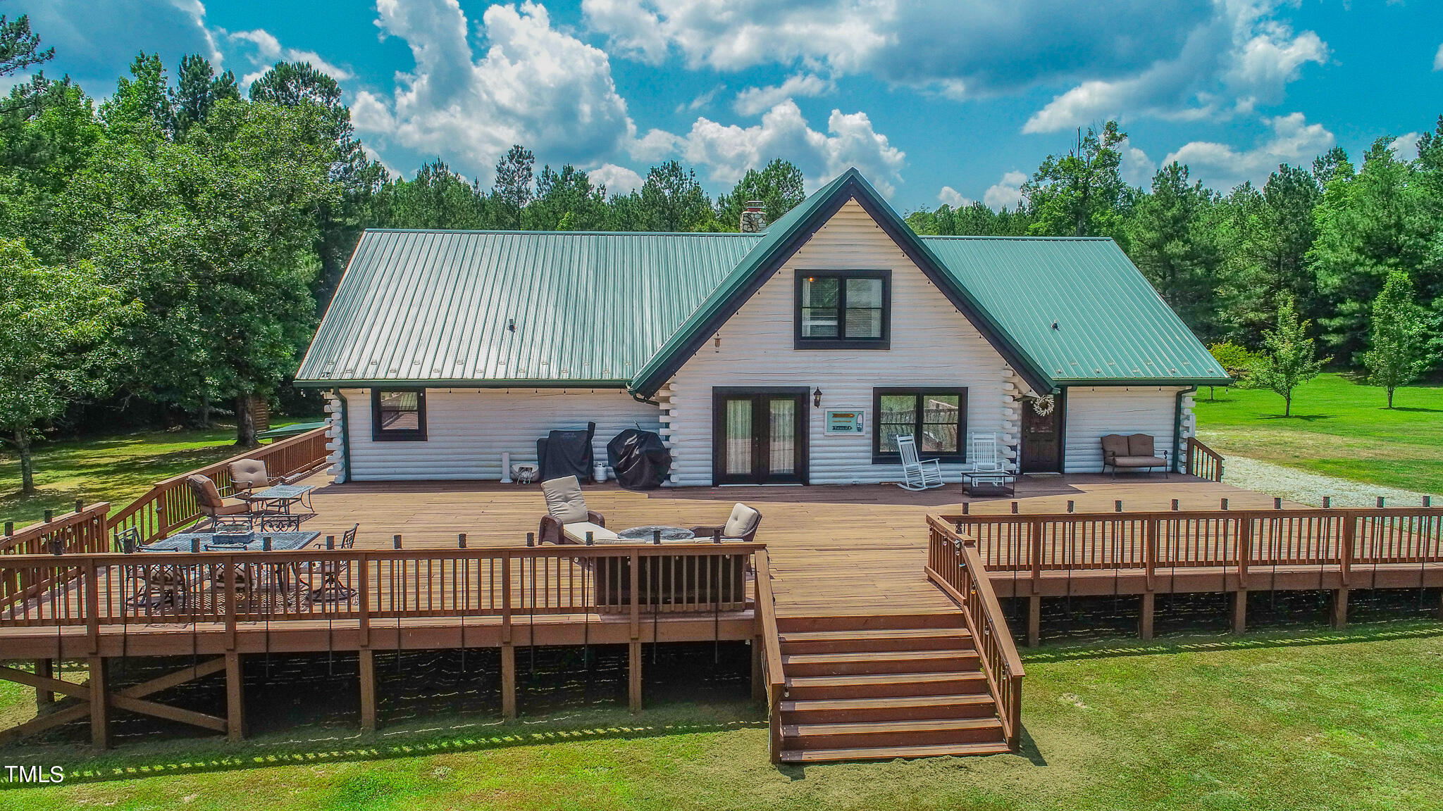 9529 Hester Road Hurdle Mills, NC 27541 - Photo 5 of 85 a front view of a house with garden