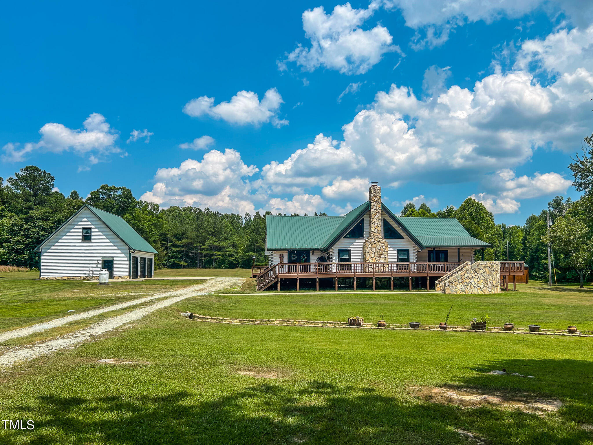 9529 Hester Road Hurdle Mills, NC 27541 - Photo 62 of 85 a view of a house with a big yard