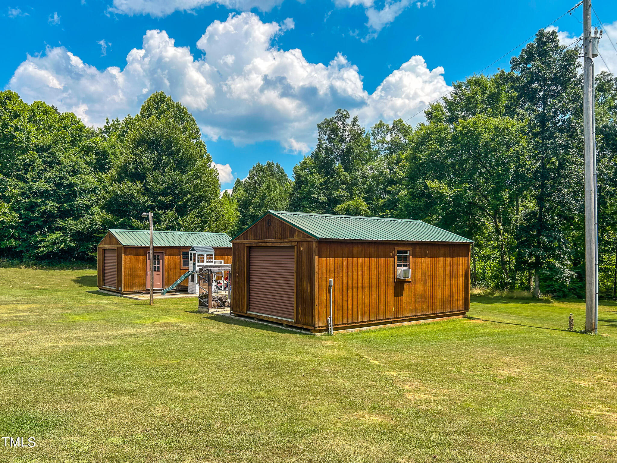 9529 Hester Road Hurdle Mills, NC 27541 - Photo 65 of 85 a view of a house with backyard