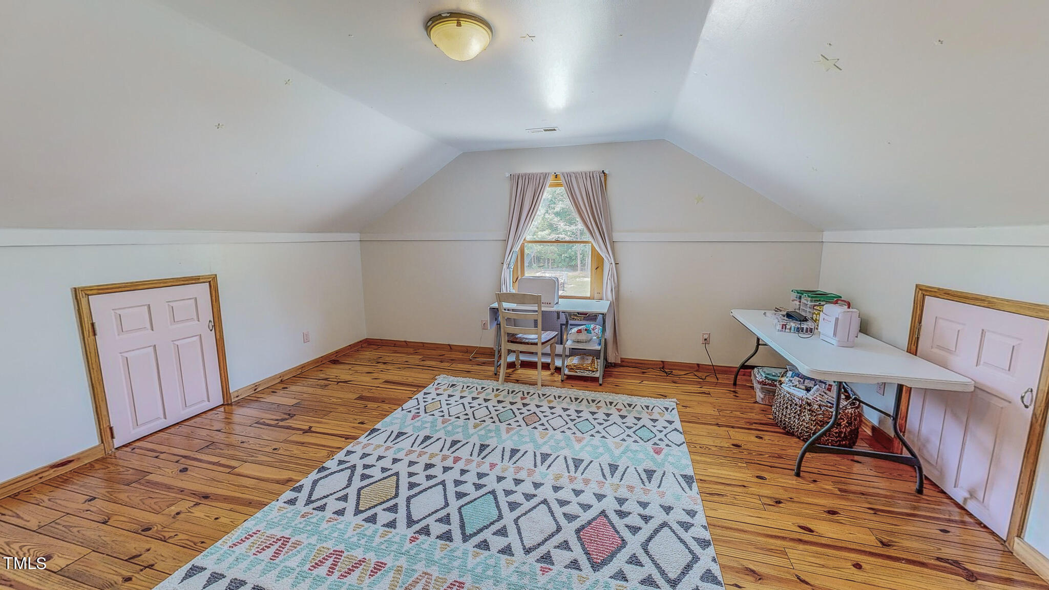9529 Hester Road Hurdle Mills, NC 27541 - Photo 76 of 85 a bedroom with furniture and a window