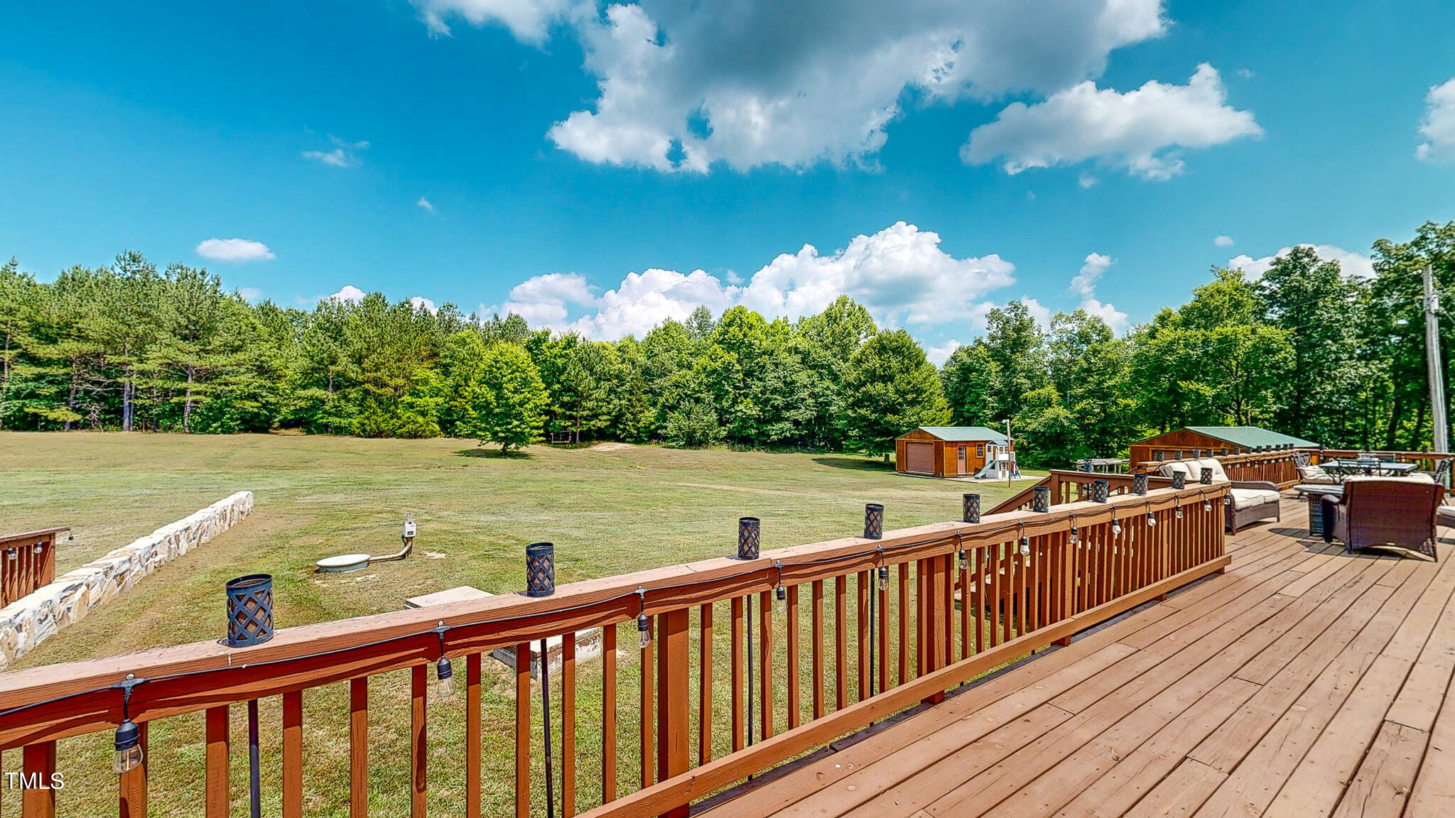 9529 Hester Road Hurdle Mills, NC 27541 - Photo 78 of 85 a view of a balcony with wooden floor